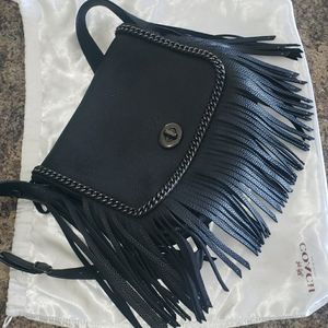 Large coach dakotah crossbody full fringe.